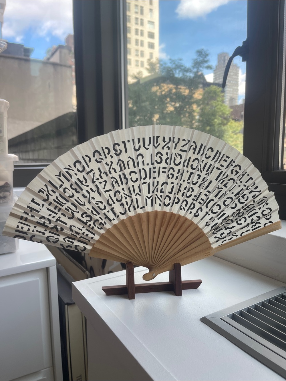 Byredo Folding Hand Fan with stand. Limited edition.